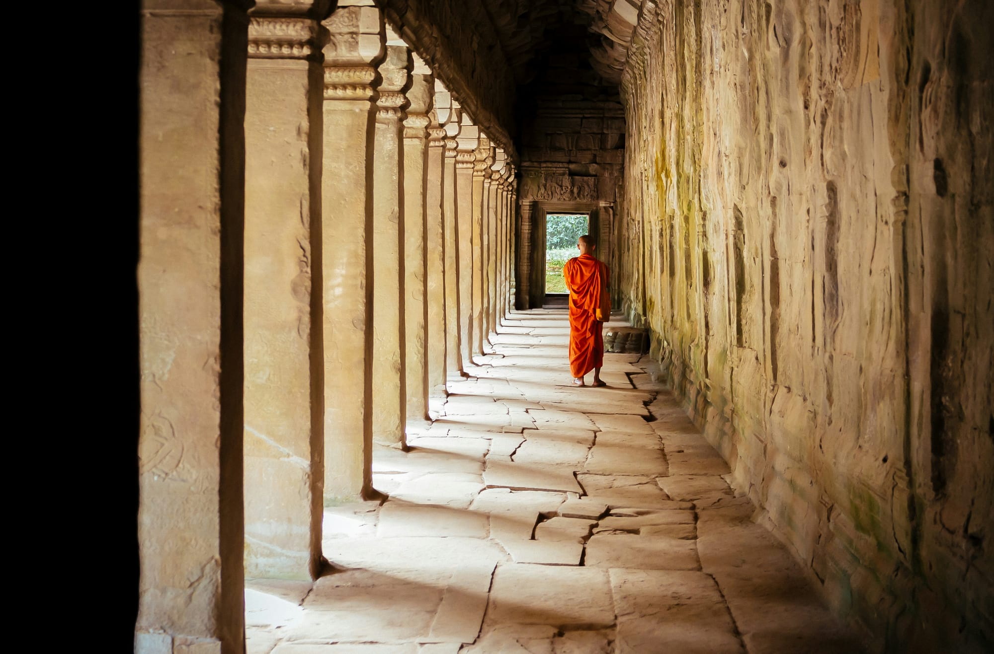 A Buddhist monk at Angkor Wat.